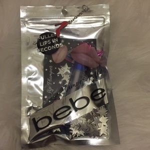 Bebe....lip plumper...it’s a clear lip gloss.